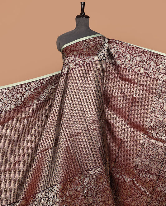 Maroon jacquard silk saree, big zari border & pallu accentuated with floral & bird jaal jacquard zari design