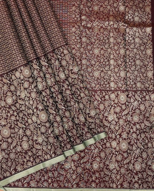 Maroon jacquard silk saree, big zari border & pallu accentuated with floral & bird jaal jacquard zari design