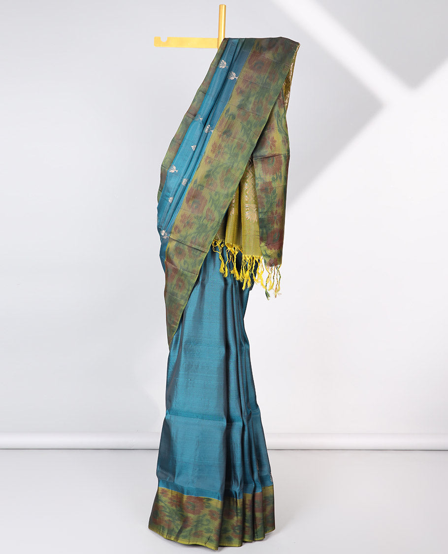 Blue floral motifs semi-soft silk sare with contrast floral border & pallu of ogee pattern