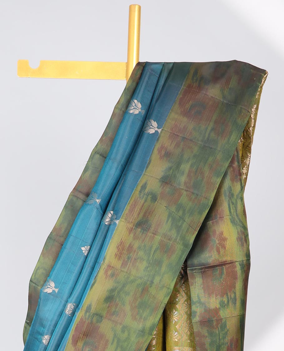 Blue floral motifs semi-soft silk sare with contrast floral border & pallu of ogee pattern