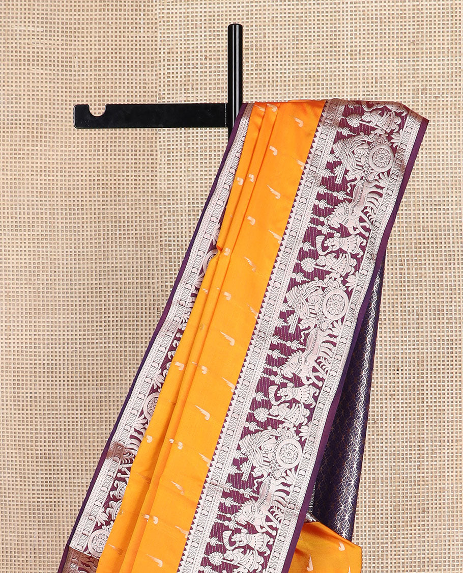 Orange muniya buttas soft silk saree, contrast traditional zari border of wedding-theme designs, and jaal pallu