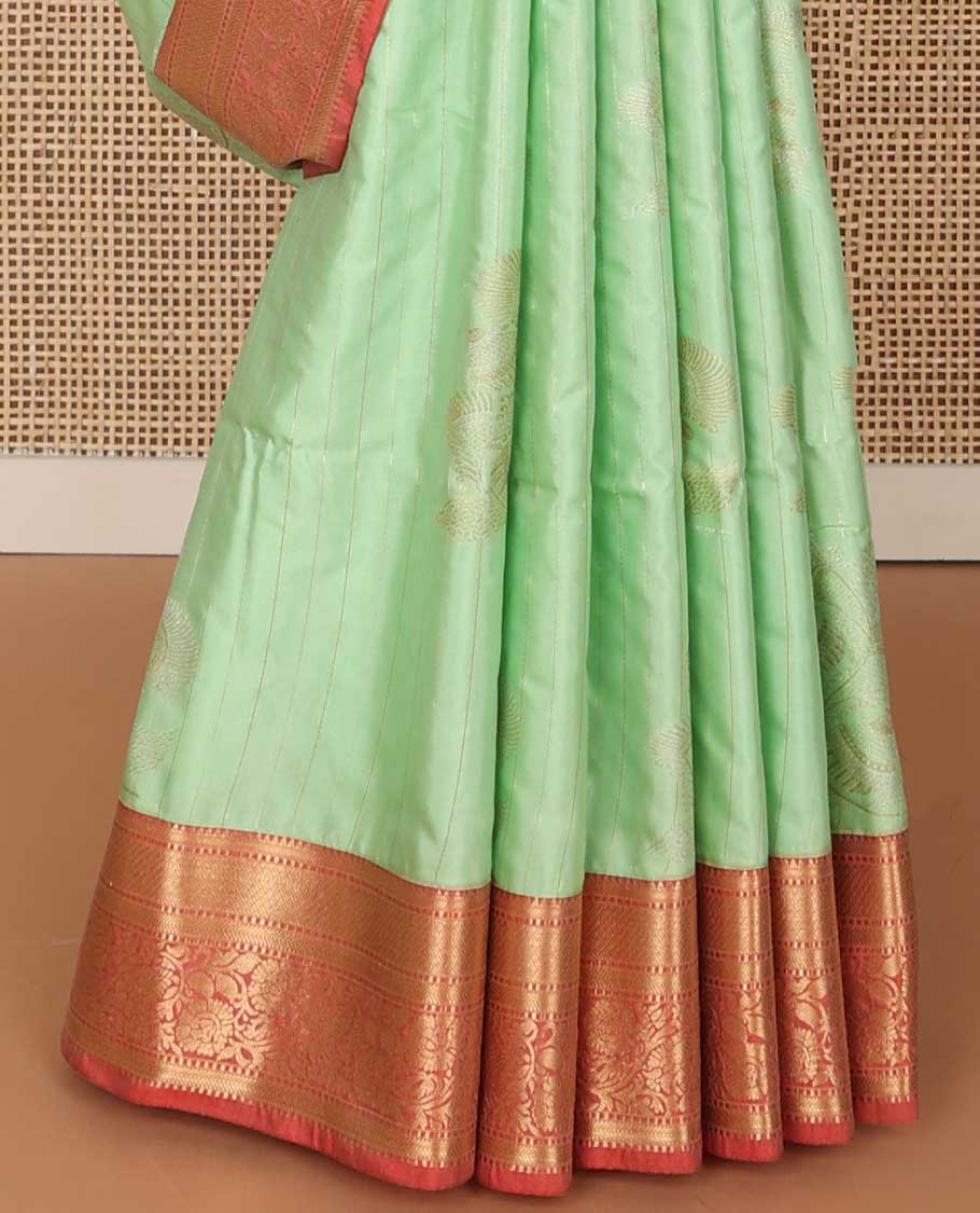Light green striped, motifs soft silk saree with contrast zari design border & floral design pallu