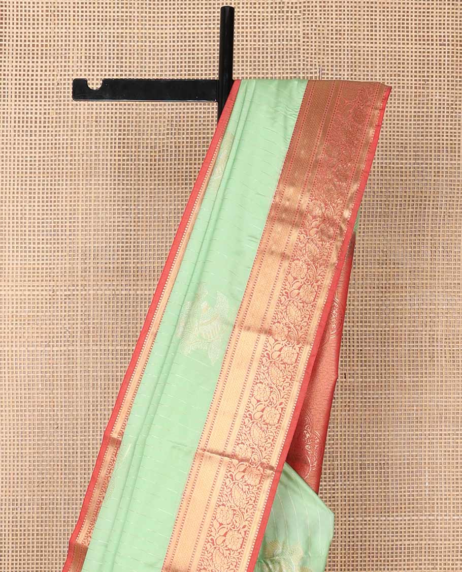 Light green striped, motifs soft silk saree with contrast zari design border & floral design pallu
