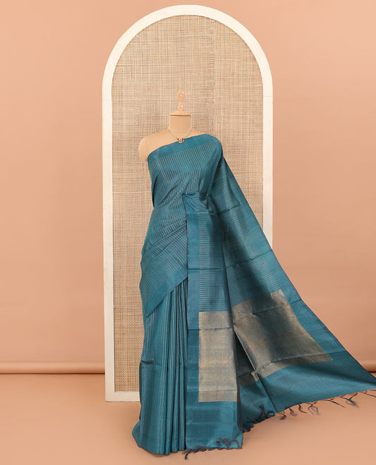 Blue tiny boxed motif stripes tussar silk saree, self-border, and gleaming zari pallu