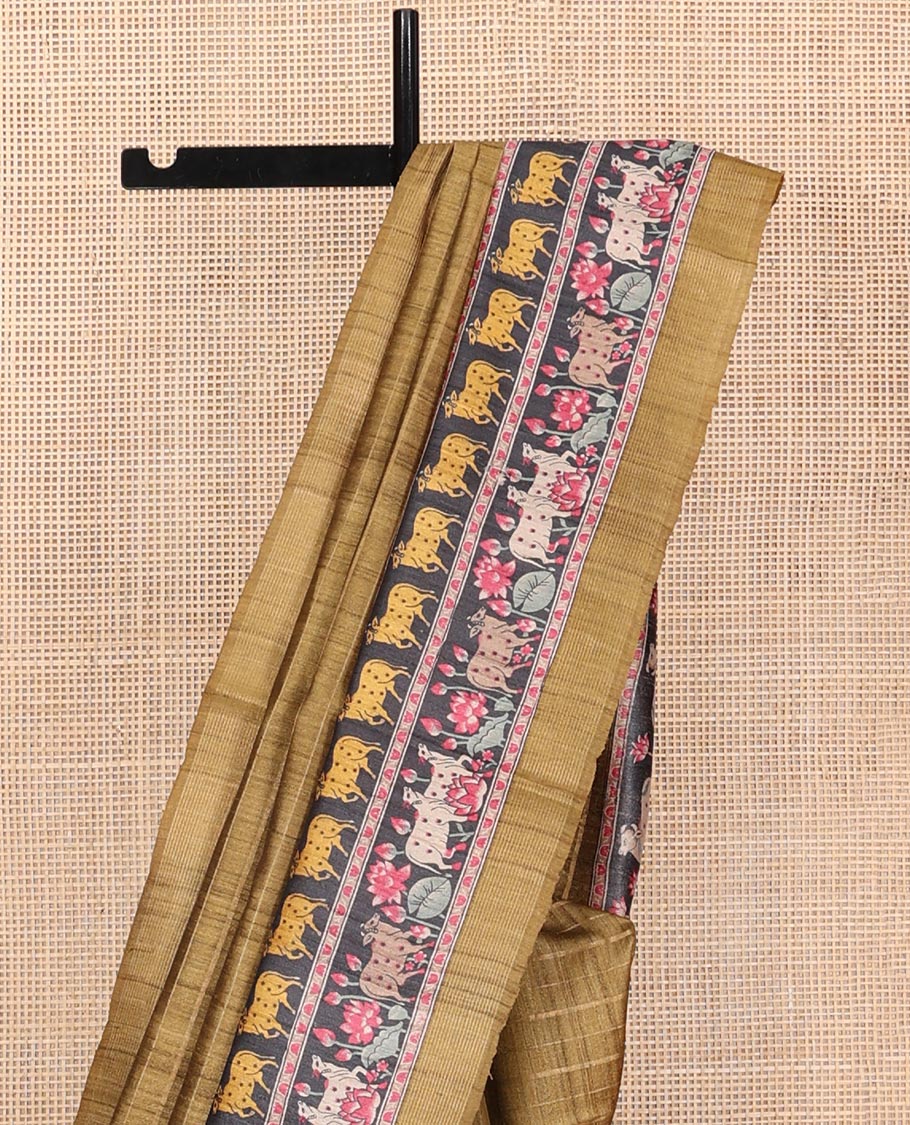 Mustard Tussar Silk Saree, Sparsely Threaded with Stripes, Complemented by a Contrast Pichwai Cow-Lotus Print Border, Printed Pallu, and a Contrast Blouse
