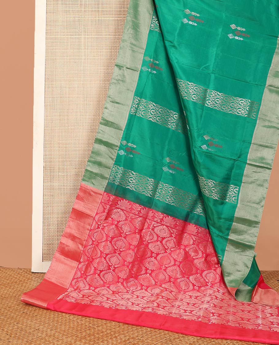 Green zari buttas Uppada saree, bavanji border, and contrast intricately designed pallu