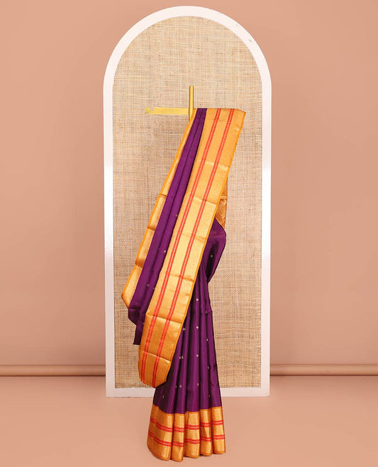 Purple Vasundhara Lite-Silk Mix Saree Decked Up with Zari Buttas on Its Body, Complemented by a Contrast Border of Neli, Muthu, and Kodi Visiry Designs, Pallu Spotlighted with Jaal Designs, and Paired with a Contrast Blouse