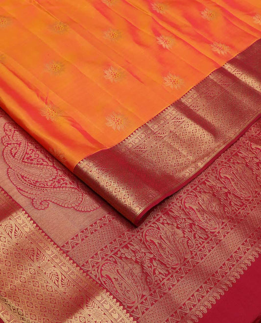 Orange zari buttas Vasundhara silk mix saree, contrast border of thilakam, muthu, manga, kodi visiry, and jaal and Mughal-style paisley woven pallu