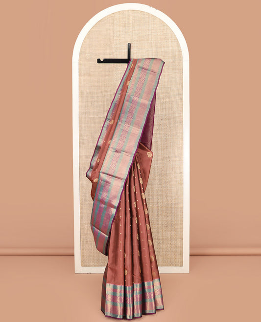 Brown Vasundhara Lite Silk Mix Saree, Elegantly Highlighted with Manga Buttas All Over Its Body, Complemented by Contrast Border of Thilakam Mokku, Kamalam, Yaanai, and Mayil Designs, Grandly Pallu of Diagonal Stripes, and Paired with a Contrast Blouse