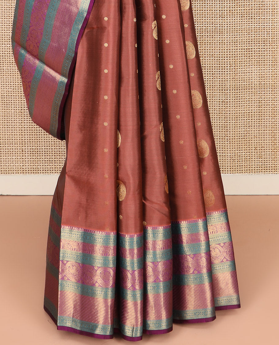 Brown Vasundhara Lite Silk Mix Saree, Elegantly Highlighted with Manga Buttas All Over Its Body, Complemented by Contrast Border of Thilakam Mokku, Kamalam, Yaanai, and Mayil Designs, Grandly Pallu of Diagonal Stripes, and Paired with a Contrast Blouse