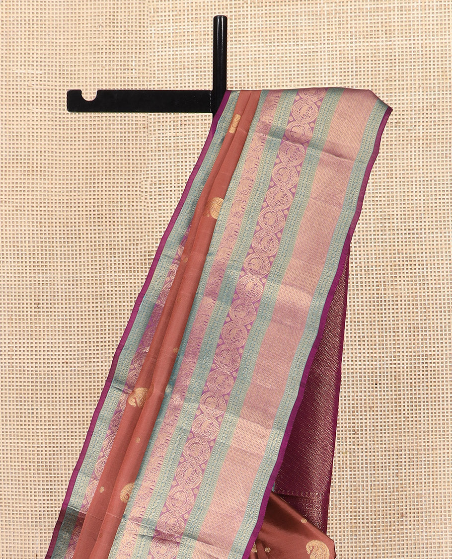 Brown Vasundhara Lite Silk Mix Saree, Elegantly Highlighted with Manga Buttas All Over Its Body, Complemented by Contrast Border of Thilakam Mokku, Kamalam, Yaanai, and Mayil Designs, Grandly Pallu of Diagonal Stripes, and Paired with a Contrast Blouse