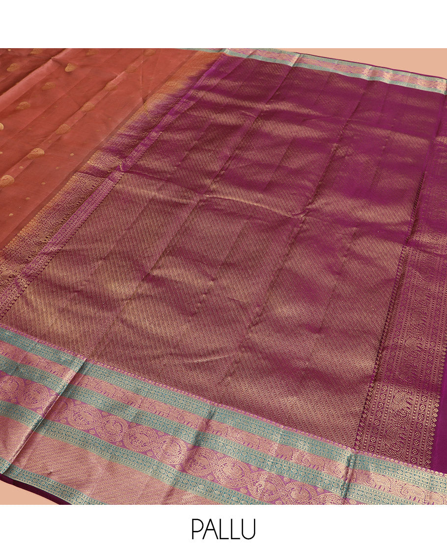 Brown Vasundhara Lite Silk Mix Saree, Elegantly Highlighted with Manga Buttas All Over Its Body, Complemented by Contrast Border of Thilakam Mokku, Kamalam, Yaanai, and Mayil Designs, Grandly Pallu of Diagonal Stripes, and Paired with a Contrast Blouse