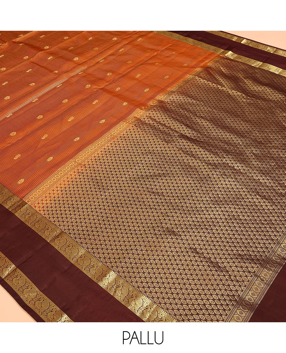 Orange Vasundhara Lite Silk Mix Saree, Embellished with Zari Butta Enclosed Checks on Its Body, Complemented by a Contrast Rettai Pettu Border of Mayil Designs, Pallu Steeped with Peaock Feather-Like Designs, and Paired with a Contrast Blouse