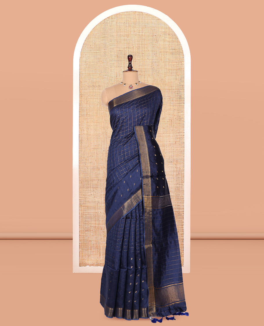 Blue Banana Pith Saree, Gleamed Up with Checks and Buttas, a Zari Temple Border, Striped Pallu, and Matching Blouse