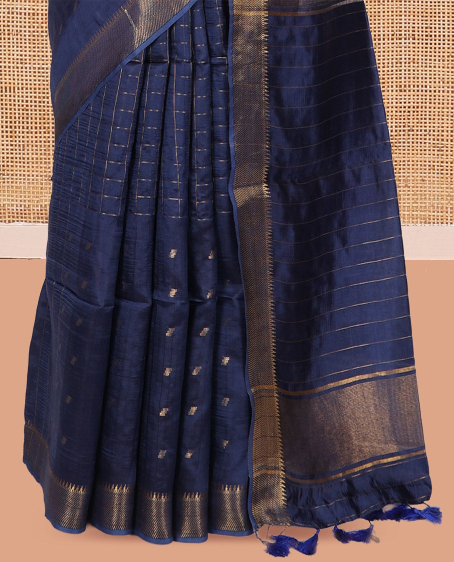 Blue Banana Pith Saree, Gleamed Up with Checks and Buttas, a Zari Temple Border, Striped Pallu, and Matching Blouse