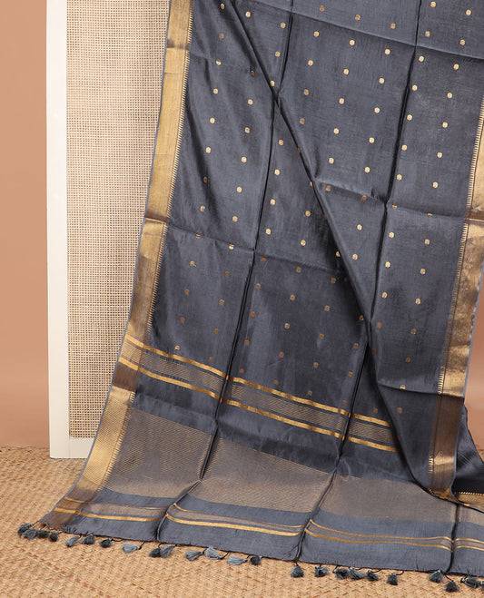 Grey buttas banana pith saree, zari temple border, and zari striped pallu