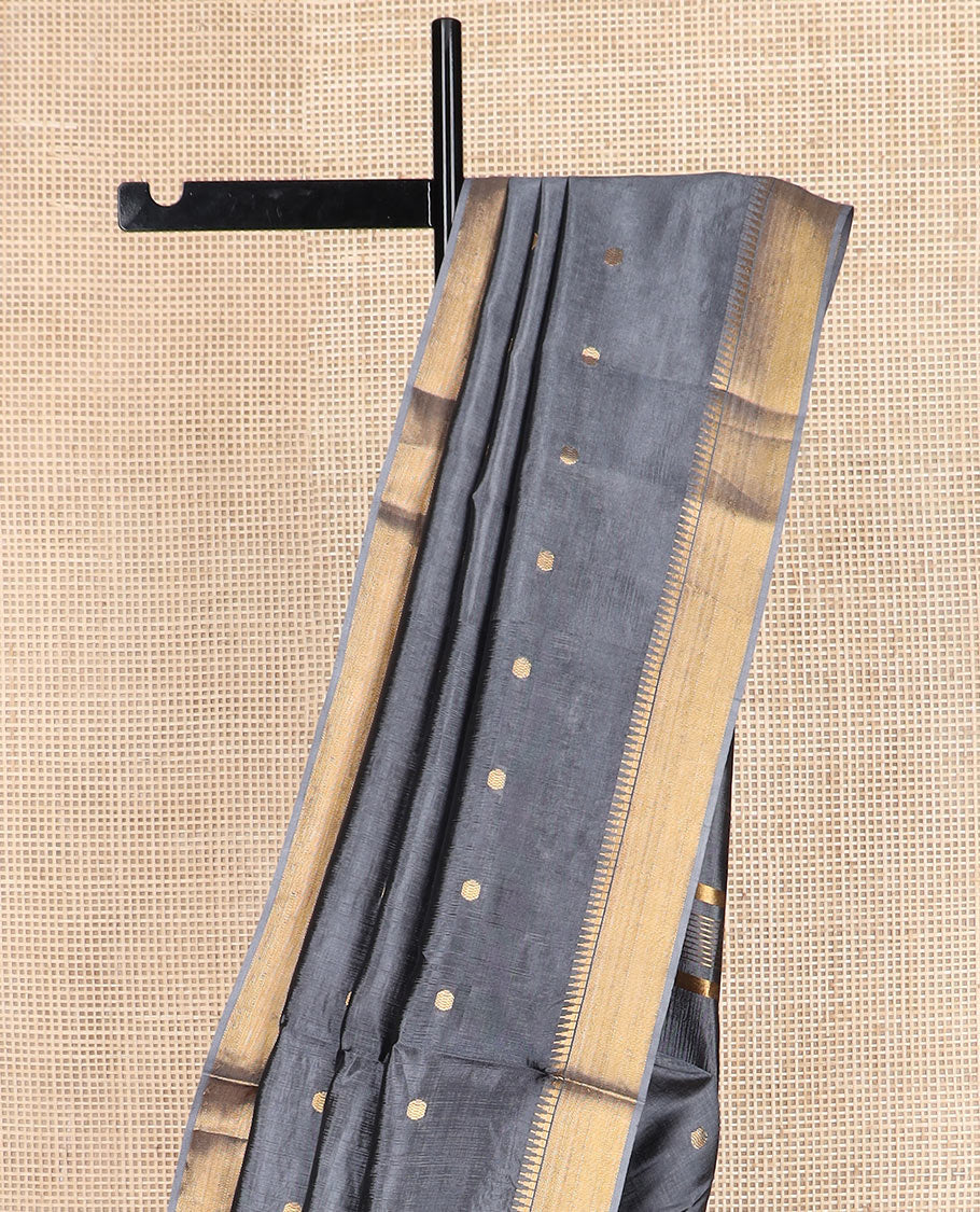 Grey buttas banana pith saree, zari temple border, and zari striped pallu