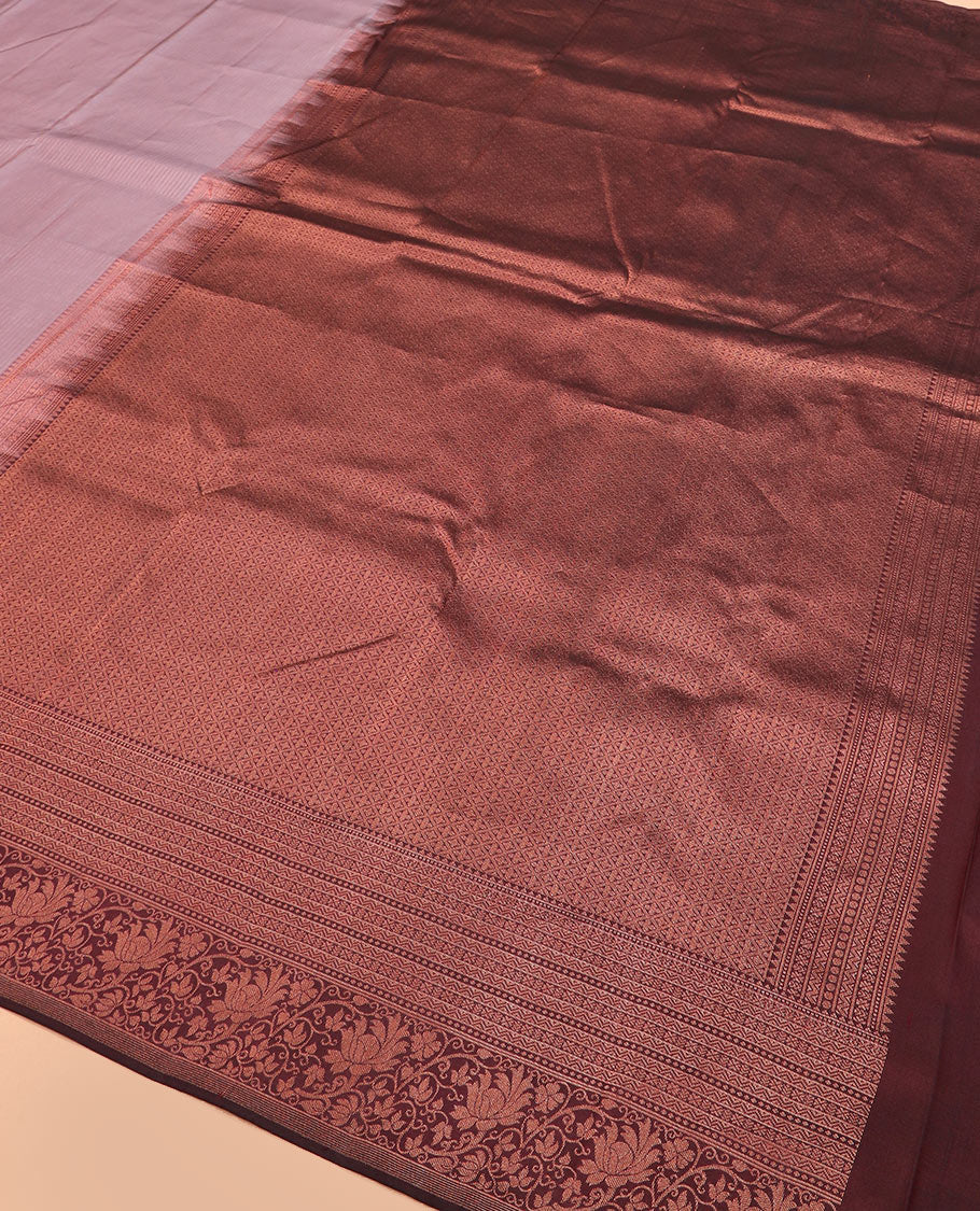 Light brown plain silk saree, contrast border of rekku, muthu, neli, and kodi visiry designs, and jaal pallu