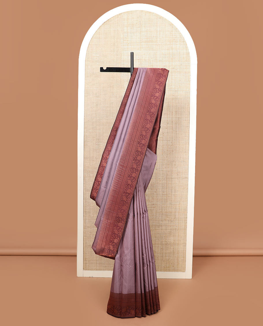 Light brown plain silk saree, contrast border of rekku, muthu, neli, and kodi visiry designs, and jaal pallu