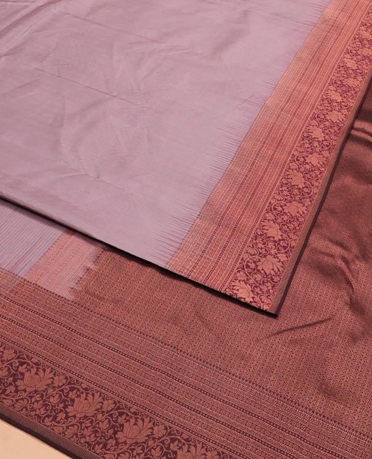 Light brown plain silk saree, contrast border of rekku, muthu, neli, and kodi visiry designs, and jaal pallu