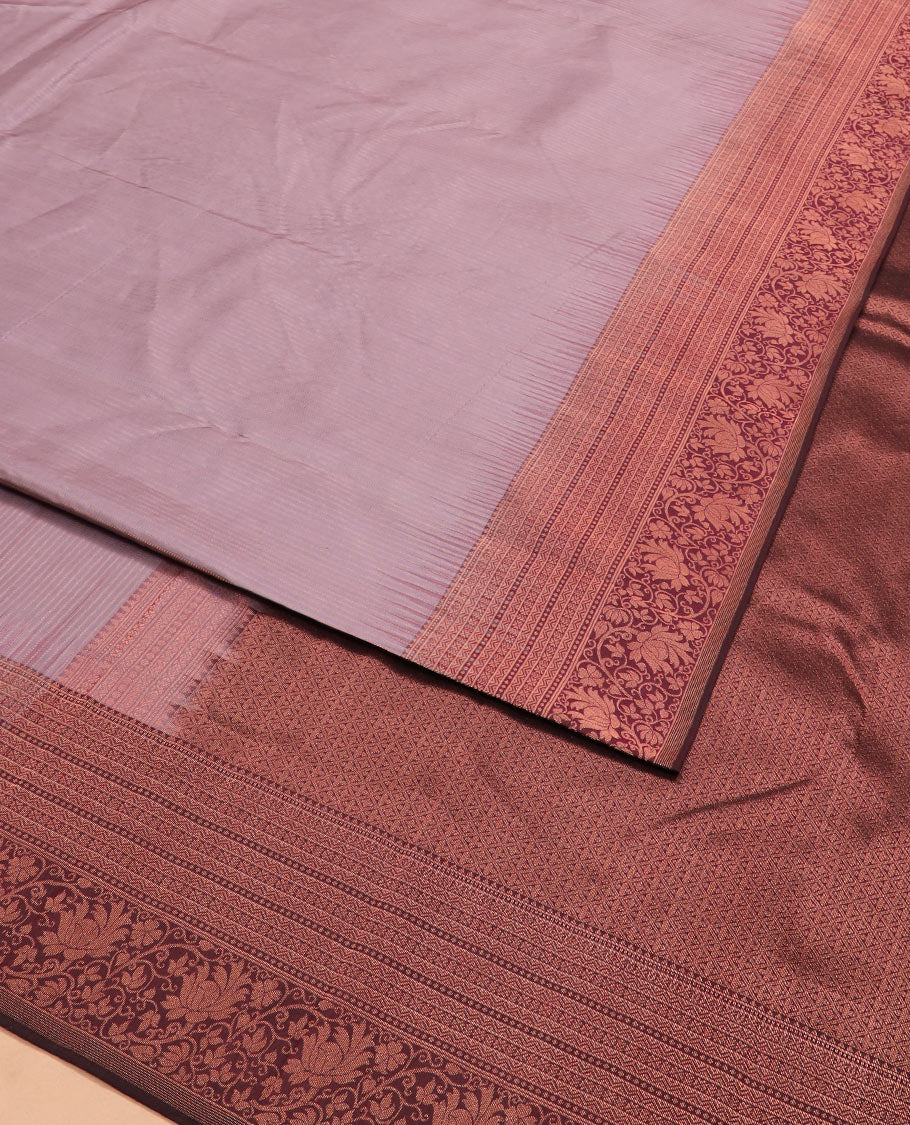 Light brown plain silk saree, contrast border of rekku, muthu, neli, and kodi visiry designs, and jaal pallu