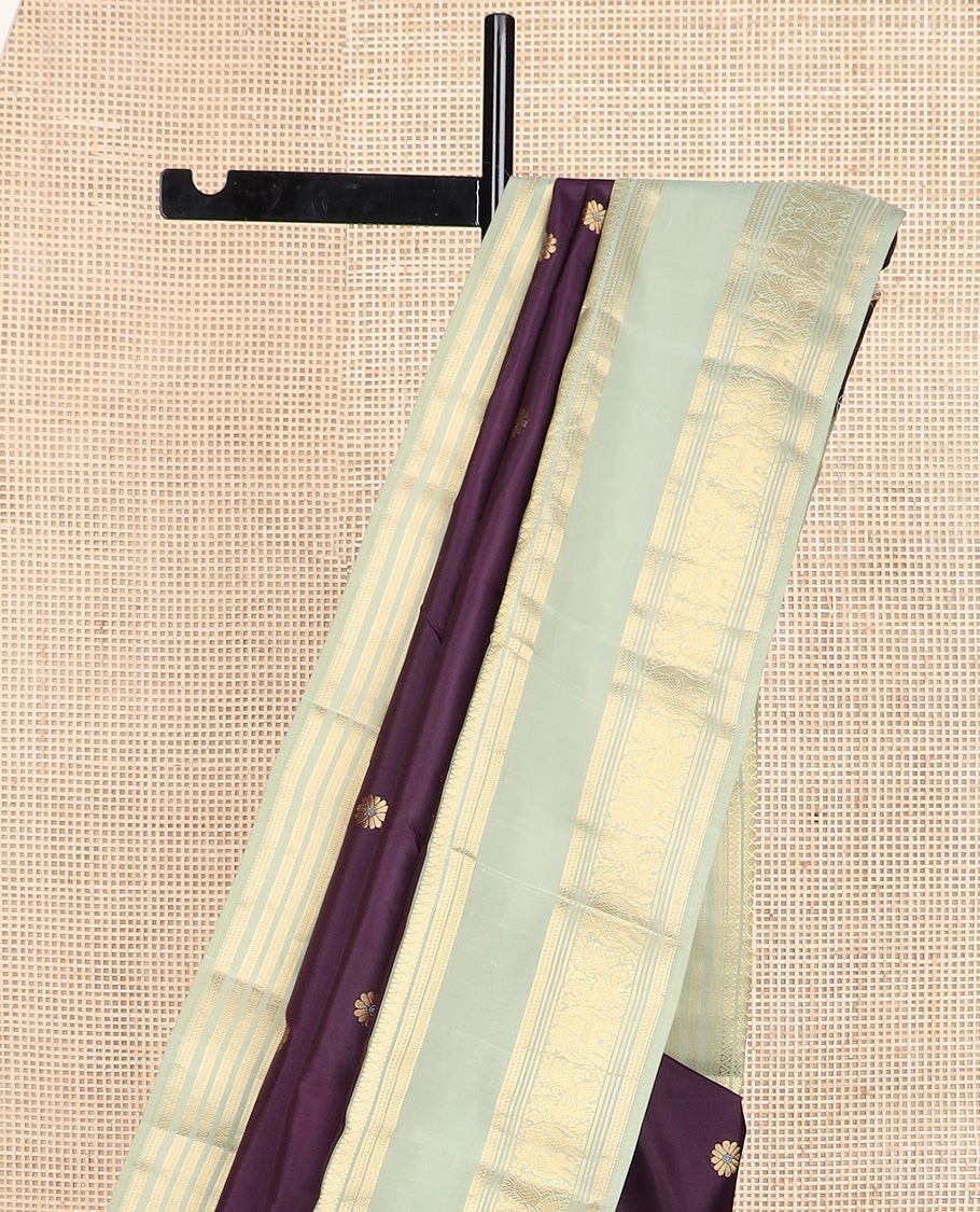 Purple meenakari kamalam buttas silk saree, contrast rettai pettu border of thilakam, neli, kathir, mayil, and yanaai designs, and intricate pallu