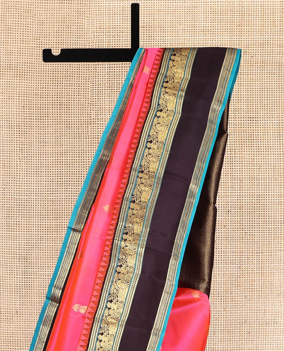 Pink Vasundhara Silk Saree, Embellished with Zari Buttas, Complemented by Contrast Rettai Pettu Temple Border, Grand Paiyadi Kattam Pallu, and a Contrast Blouse