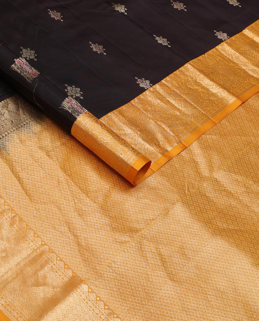 Black meena buttas silk saree, contrast zari border of rekku, rudraksham & mayil designs & pallu of kamalam designs