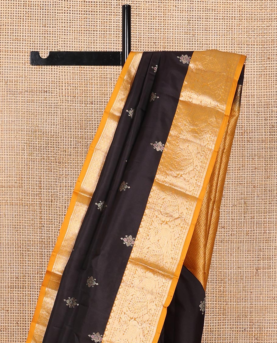 Black meena buttas silk saree, contrast zari border of rekku, rudraksham & mayil designs & pallu of kamalam designs