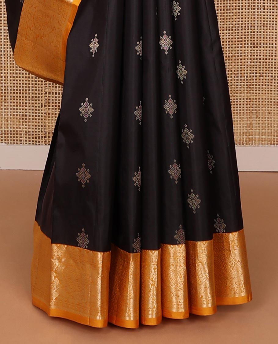 Black meena buttas silk saree, contrast zari border of rekku, rudraksham & mayil designs & pallu of kamalam designs