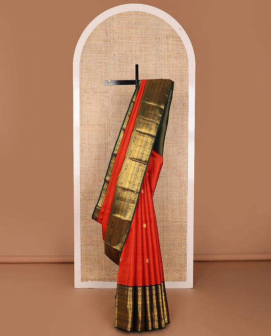 Orange zari buttas silk saree, contrast jaal pallu & border of rekku,banaras,mayil,paiyaadi kattam & kamalam designs