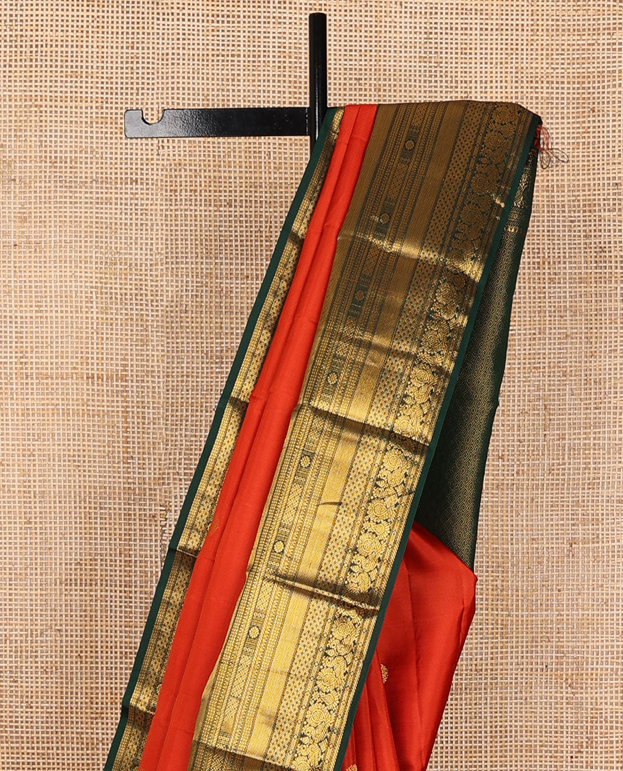 Orange zari buttas silk saree, contrast jaal pallu & border of rekku,banaras,mayil,paiyaadi kattam & kamalam designs