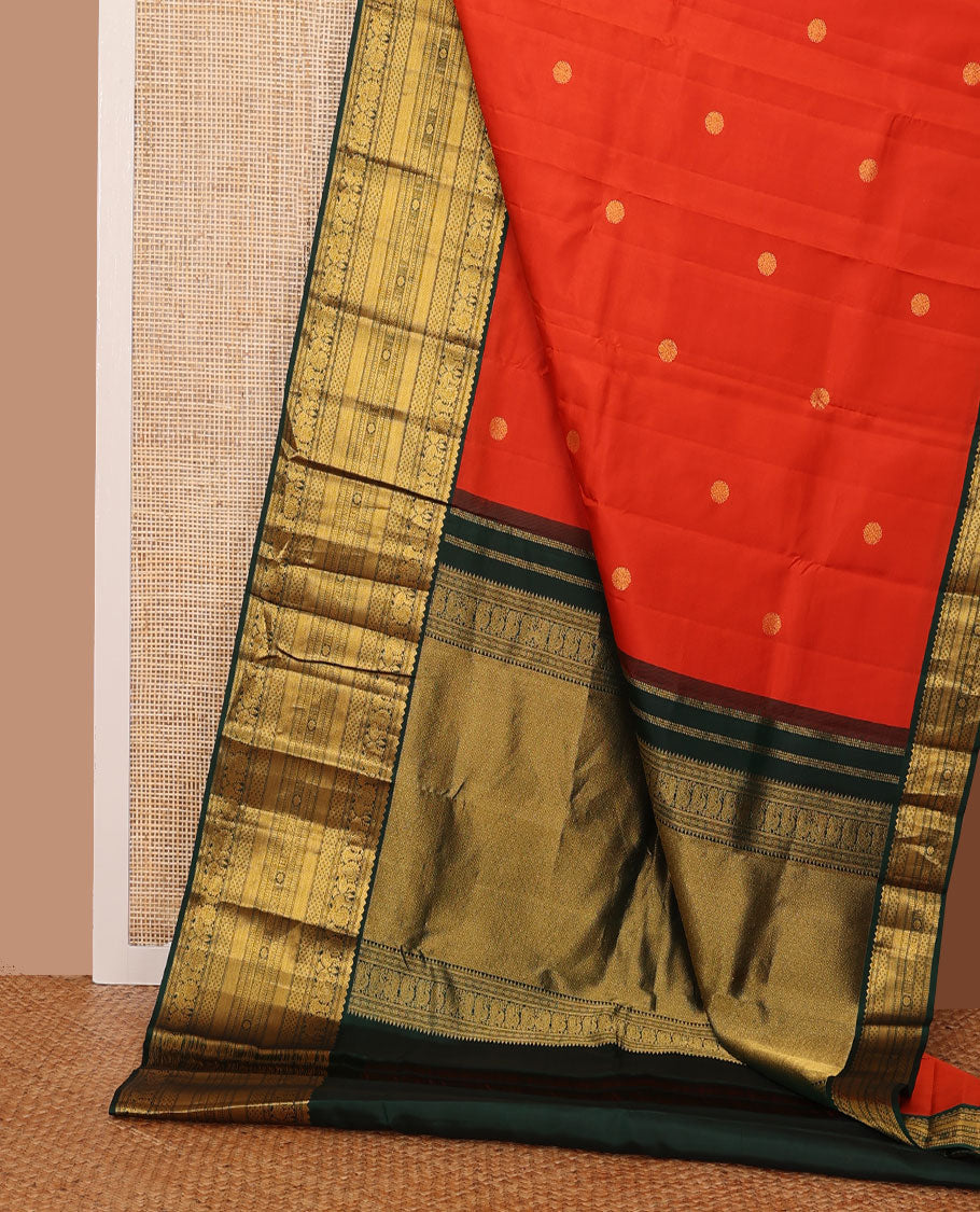 Orange zari buttas silk saree, contrast jaal pallu & border of rekku,banaras,mayil,paiyaadi kattam & kamalam designs