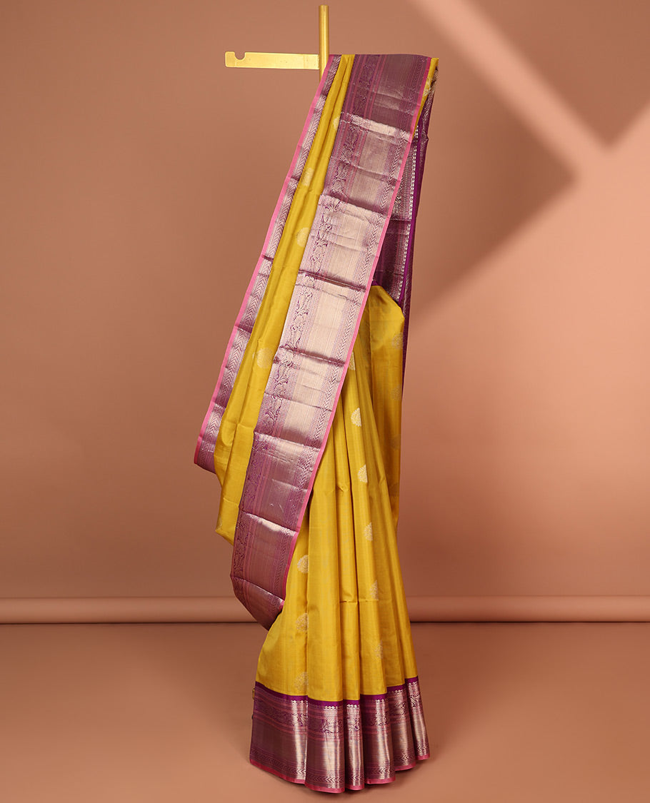Green floral buttas silk saree with contrast border of muthu, manga , kuyil kann design & floral zari design pallu