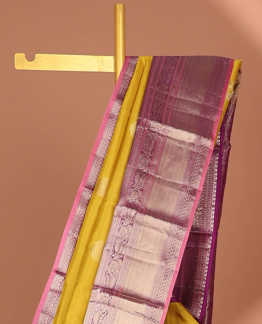 Green floral buttas silk saree with contrast border of muthu, manga , kuyil kann design & floral zari design pallu