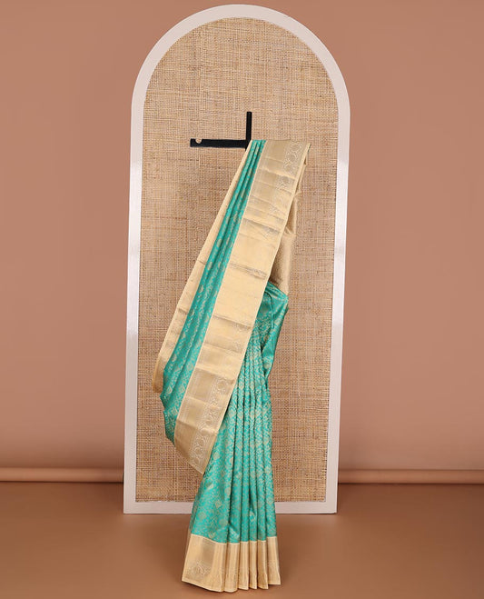 Blue floral jacquard kanchipuram wedding silk saree, contrast zari border of thilakam, mayil kann & kodi manga & ogee patterned pallu