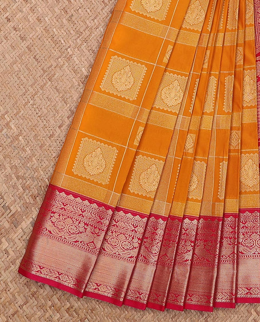 Orange zari buttas and checked gift saree, contrast traditional zari design border, and intricate pallu