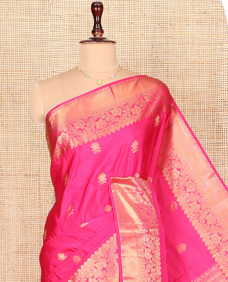 Pink Budget Silk Saree Enthralled with Zari Buttas All Over Its Body, Highlighted by a Zari Traditional Border of Floral Creeper Designs, Grand Pallu of Scallop Designs, and Paired with a Matching Blouse