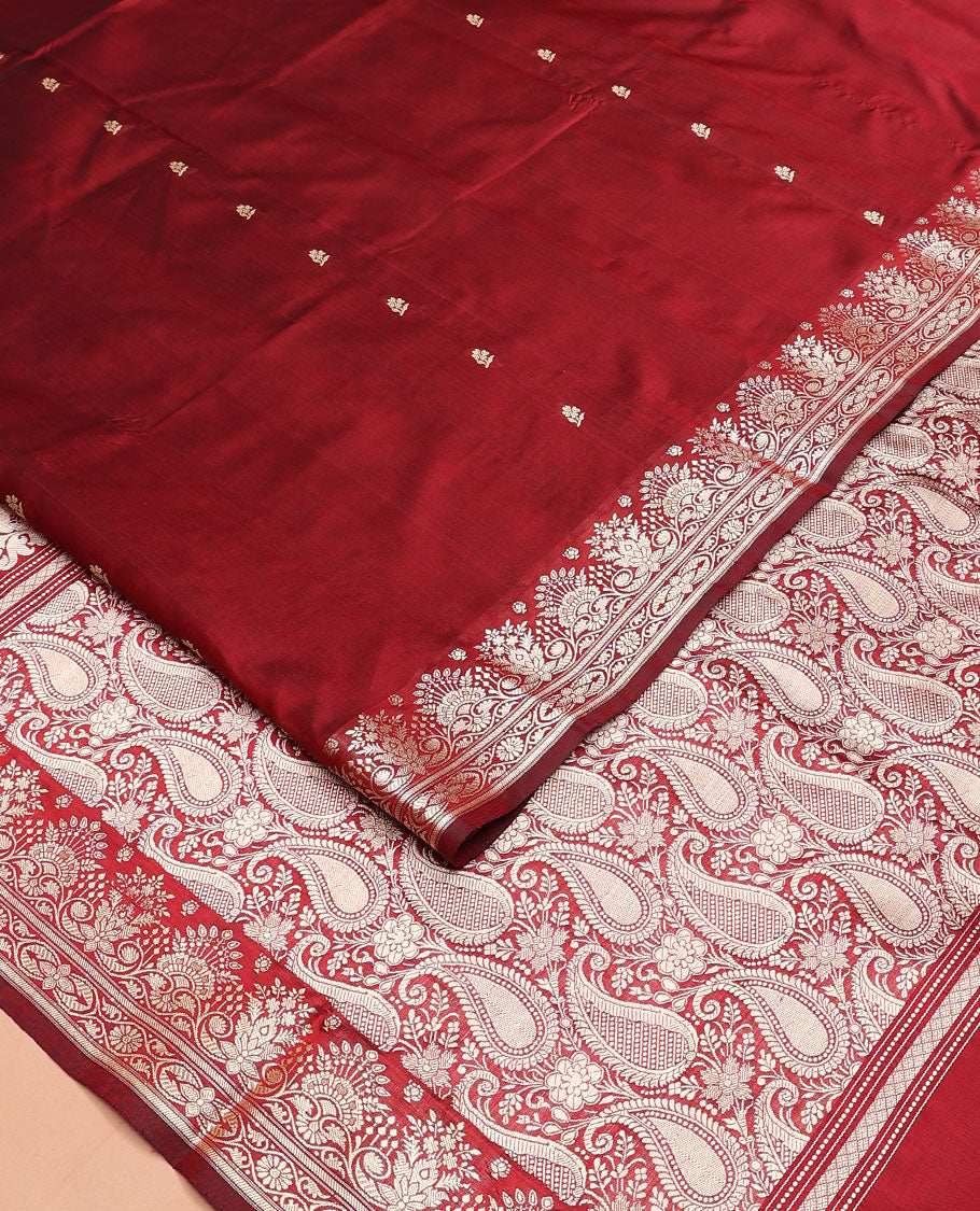 Red buttas kathan silk saree, floral zari border, and paisley vine design pallu