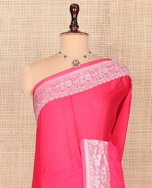 Pink Plain Fancy Crepe Saree, Highlighted by a Floral Border, Intricately Designed Pallu, and a Matching Blouse