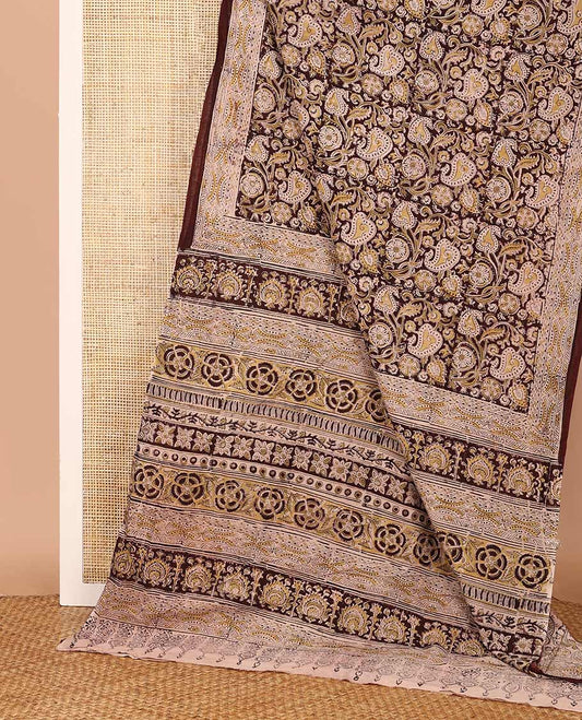 Brown leaf vine machine-printed Kalamkari cotton saree, geometric printed border, and pallu of floral print