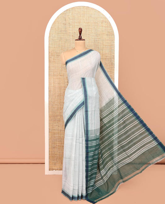 Pale Blue Andhra Cotton Saree, Sparsely Textured Heathered Patterns All Over Its Body, Complemented by Contrast Traditional Border, Pallu Steeped with Stripes, and Paired with a Matching Blouse