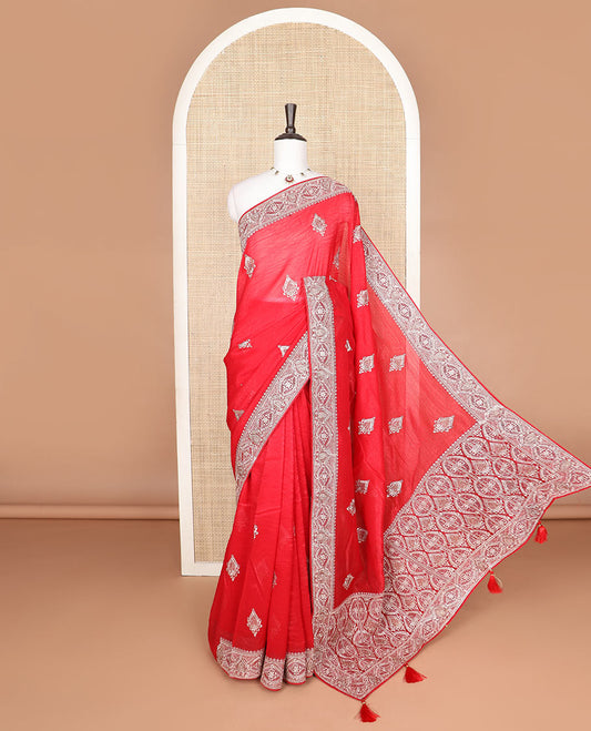 Red designer saree with unique embroidered motifs in micro-stone, intricately embroidered border
