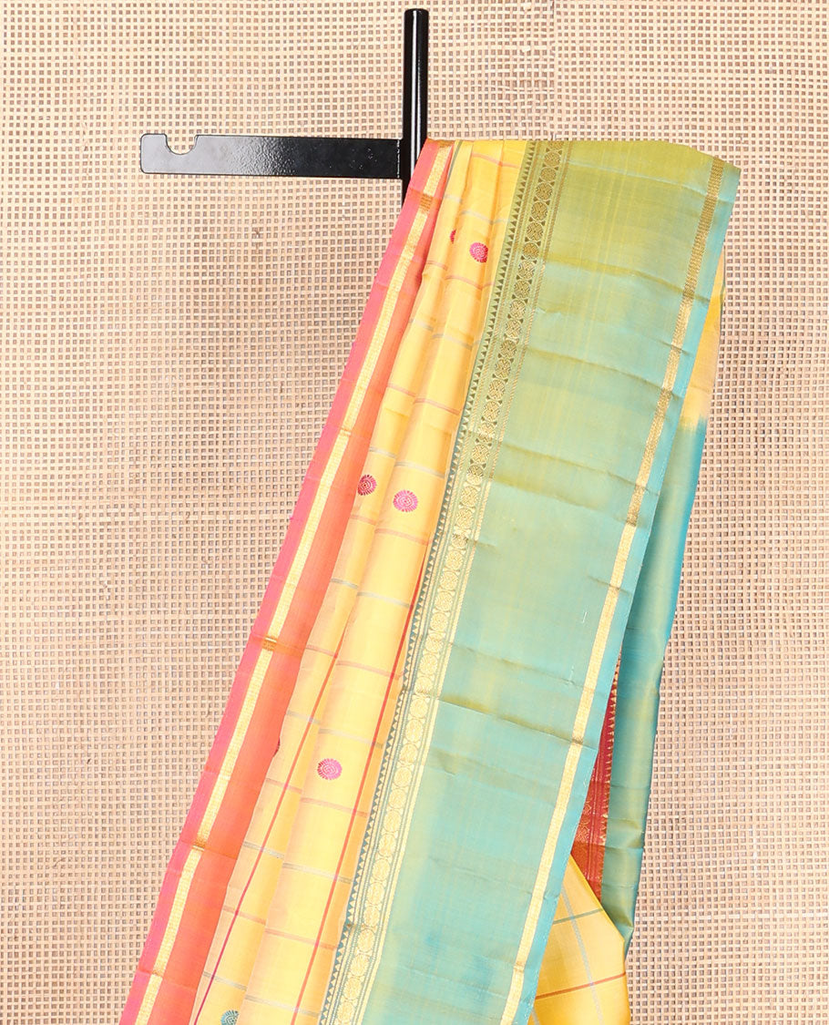 Yellow chakra butta enclosed checks kanchipuram silksaree, contrast rettai pettu ganga jamuna border of rekku,banaras,muthu & poun & chakra pallu