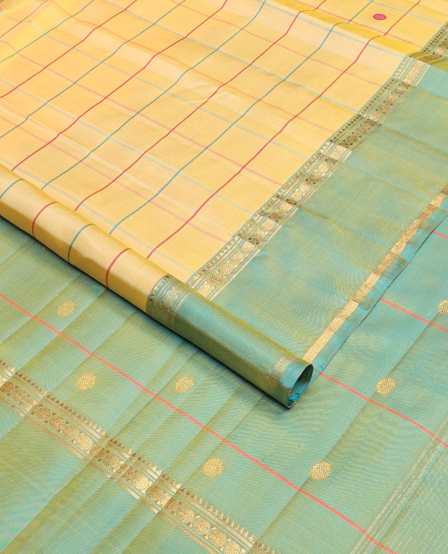 Yellow chakra butta enclosed checks kanchipuram silksaree, contrast rettai pettu ganga jamuna border of rekku,banaras,muthu & poun & chakra pallu