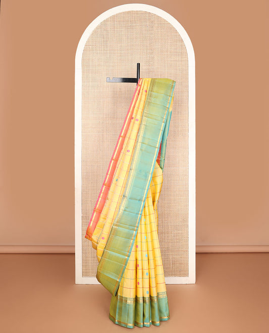 Yellow chakra butta enclosed checks kanchipuram silksaree, contrast rettai pettu ganga jamuna border of rekku,banaras,muthu & poun & chakra pallu