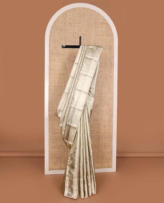 Gold jacquard Kanchipuram silk saree, wedding-theme border, and jaal pallu