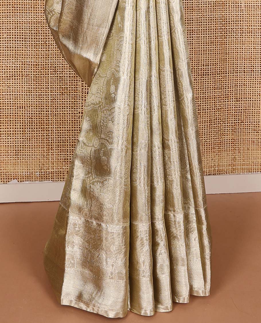 Gold jacquard Kanchipuram silk saree, wedding-theme border, and jaal pallu