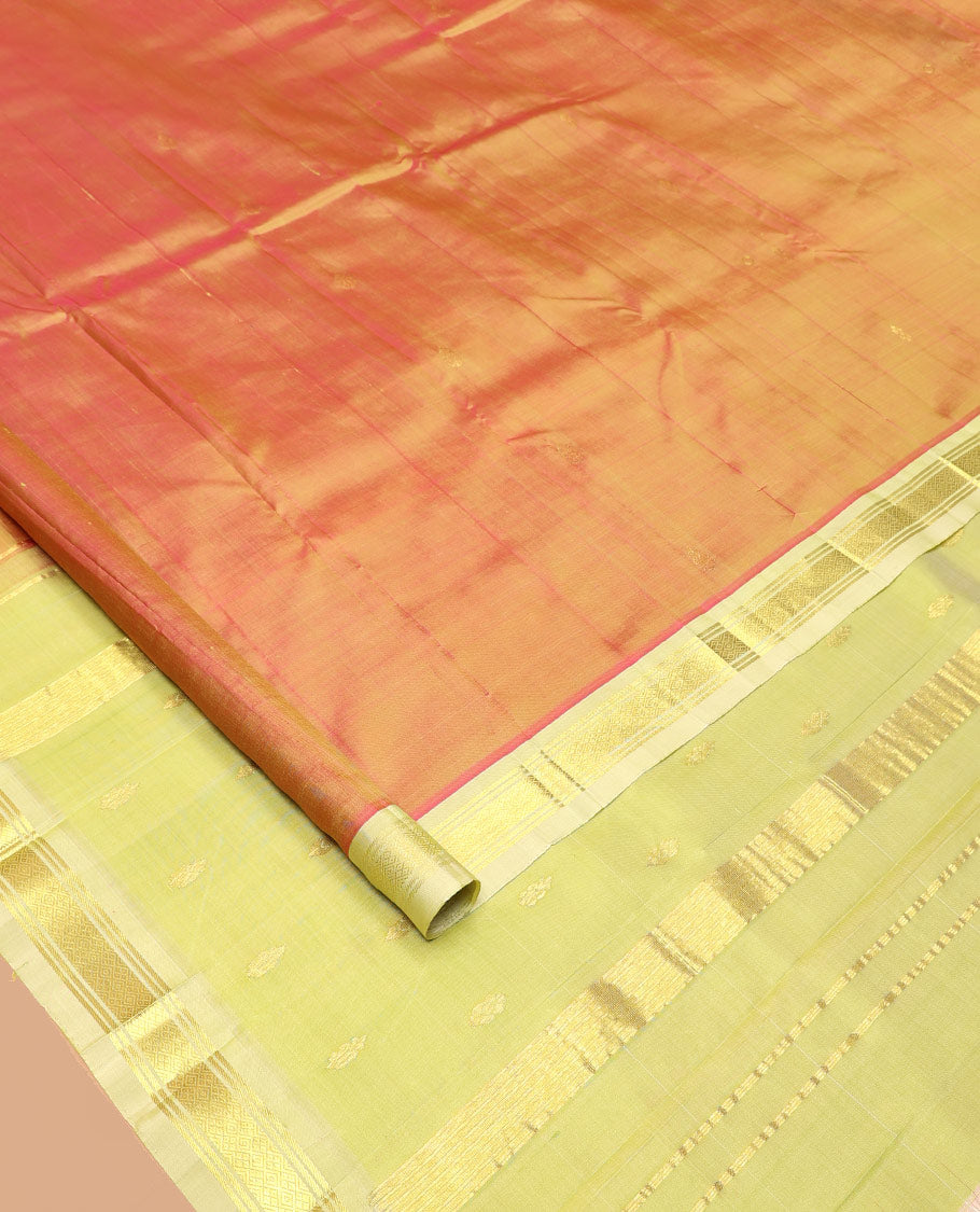 Orange Kanchipuram Silk Saree, Detailed with Zari Buttas All Over Its Body, Complemented by a Contrast One-Sided Border of Banaras, and Jaal Designs, Pallu of Zari Designs, and Comes Without a Blouse