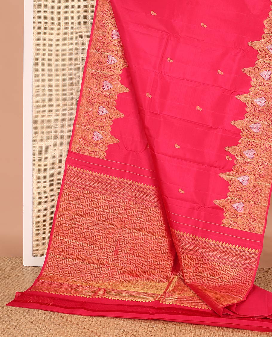 Red zari buttas Kanchipuram designer saree, intricately designed border, and pallu